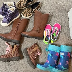 Assortment of toddler shoes.